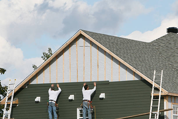 Professional Emergency Siding Repair technician working in Home, WA